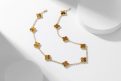 Van Cleef & Arpels Ten-Flower Tiger's Eye Necklace (Gold Color)