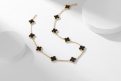 Van Cleef & Arpels Ten-Flower Black Onyx Necklace (Gold Color)